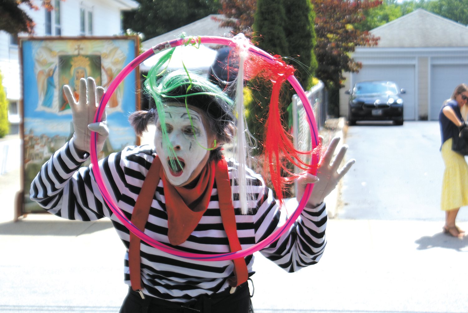 MIME TIME: Local mime performer Amy Beth Parravano entertains the crowd at St. Mary’s Feast on Sunday. (Photo courtesy Steve Popiel)